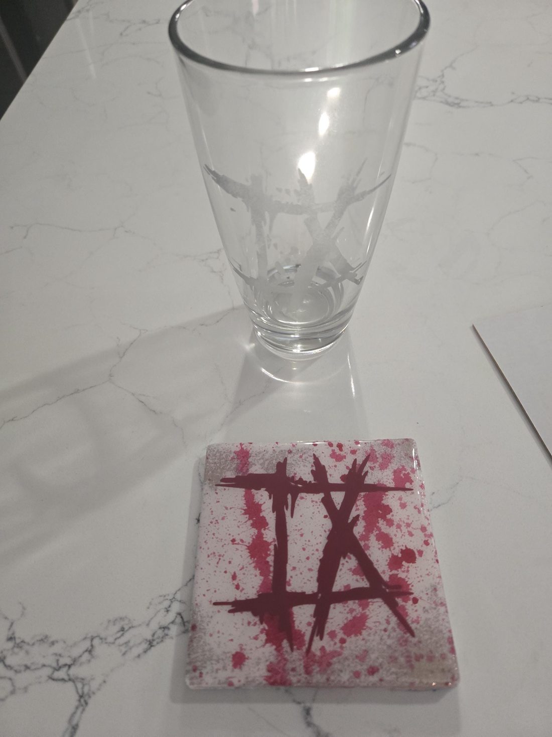 Show your Ice Nine Kills fandom with this set of 1 coaster and 1 etched pint glass.
