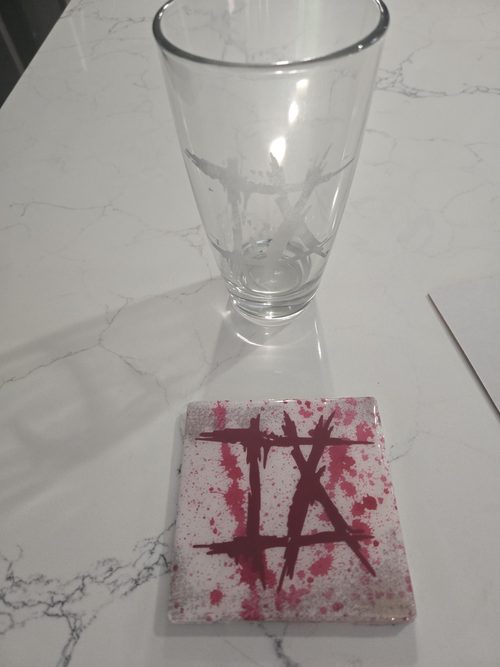 Show your Ice Nine Kills fandom with this set of 1 coaster and 1 etched pint glass.